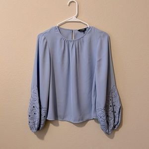Express Spring light blue blouse with fun floral details on the sleeves!